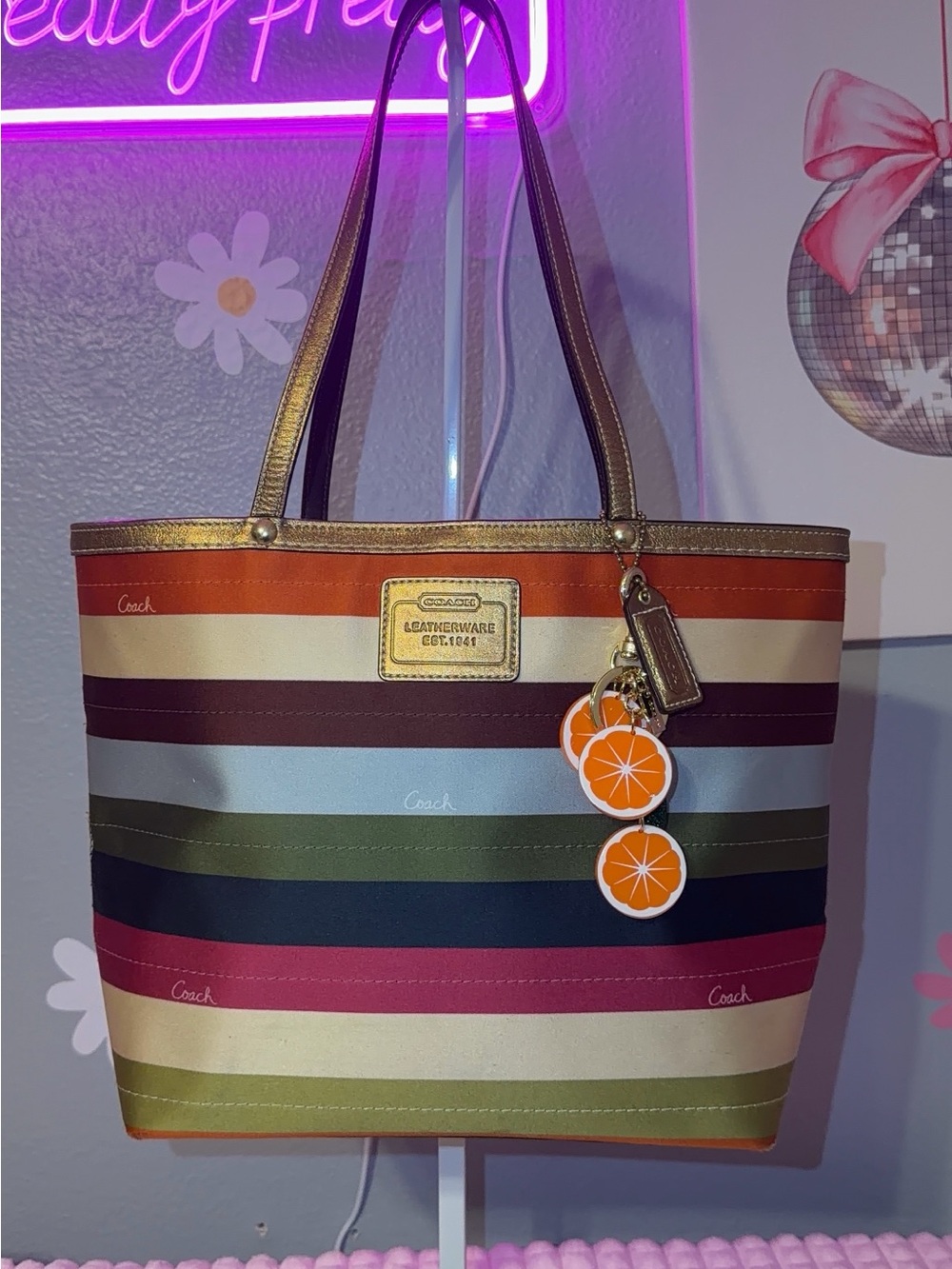 Coach Multicolor Striped Tote with Orange Charm and Gold Trim
